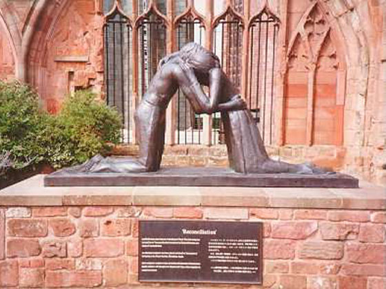 Statue of Reconciliation in front of Coventry Cathedral - tha statue was made at the occasion of the 50th Anniversary of the end of World War 2, a copy of the statue was given to the peace garen in Hiroshima Japan